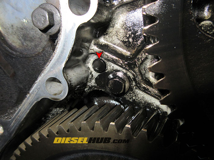Closeup view of dowel pin (KDP) on 5.9L Cummins diesel