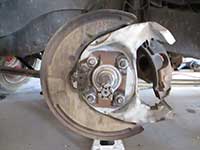 brake caliper and dust shield installed